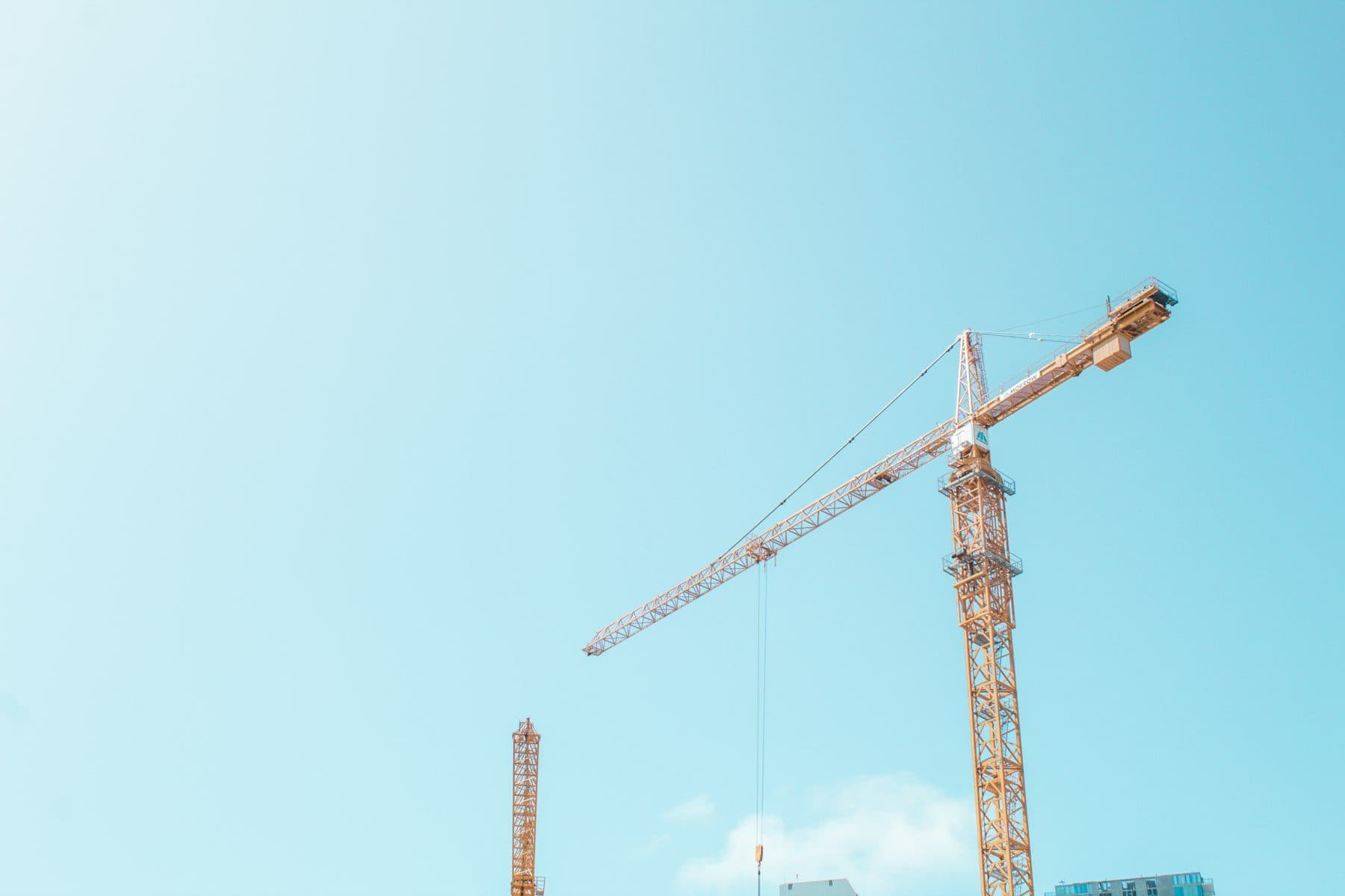 A tower crane against an open sky.